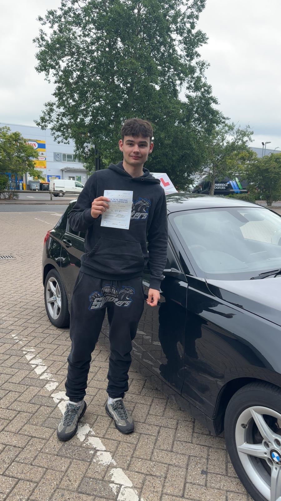 Passed student 2 celebrating their driving test success